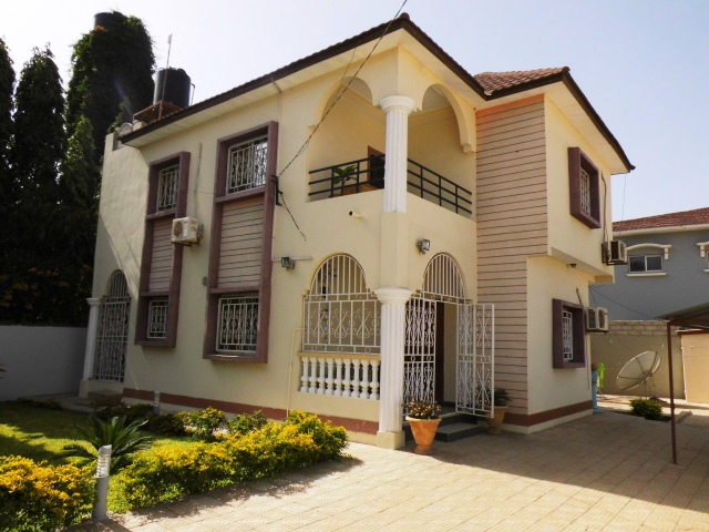 4 bedroom fully furnished house with nice garden and a boys quarters