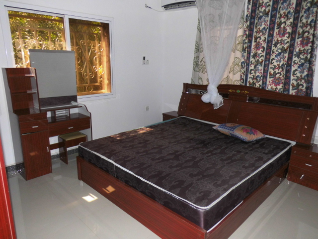 4 bedroom fully furnished house with nice garden and a boys quarters