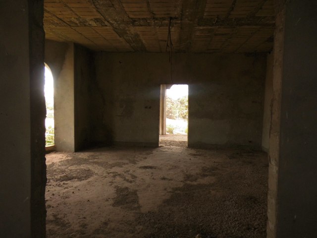 A massive unfinished 11 bedrooms storey building