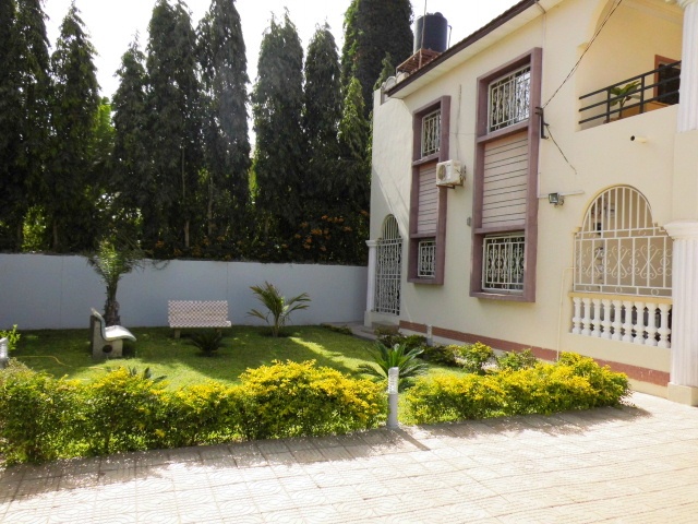 4 bedroom fully furnished house with nice garden and a boys quarters