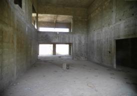 Unfinished eight‑bedroom property in Tujereng Estate