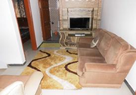 4 bedroom fully furnished house with nice garden and a boys quarters