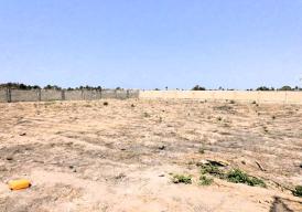100x100 plot of land in Sanyang Kachumeh