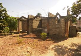 Incomplete 2-bed room house on a 20m by 20m plot