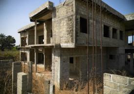 Unfinished eight‑bedroom property in Tujereng Estate