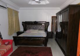 4 bedroom fully furnished house with nice garden and a boys quarters