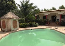 Spacious 4 Bedroom partially furnished full compound in Kerr Serigne